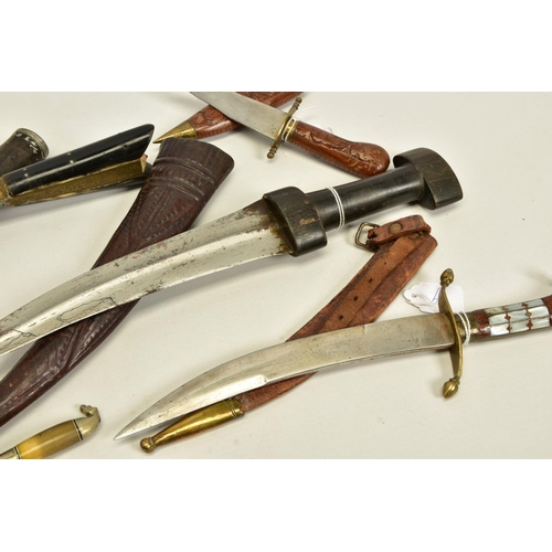 136 - FIVE x EXAMPLES OF MIDDLE EASTERN/ARABIC HAND DAGGERS. some are more ornate than others, some well c... 