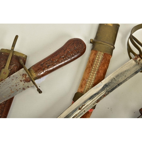 139 - TWO EXAMPLES OF INDIAN SUB-CONTINENT TOURIST PIECE DAGGERS, both marked India, both with scabbards a... 