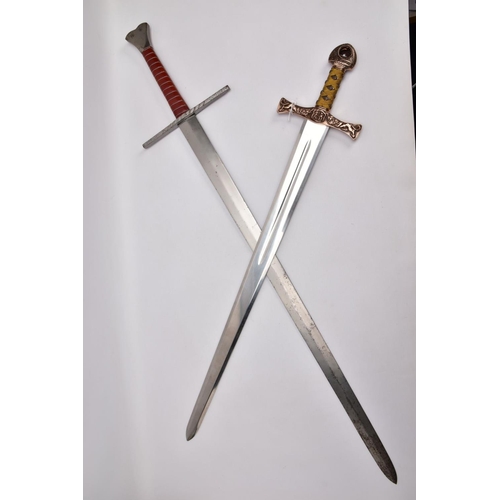 141 - TWO REPLICA COPY SWORDS, a Medieval style sword, with approximately 83cm length blade, slightly full... 