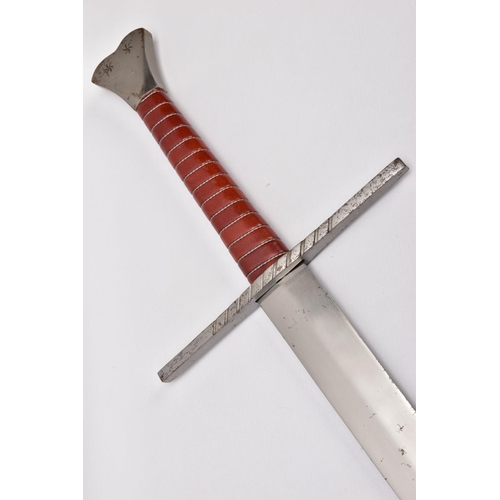 141 - TWO REPLICA COPY SWORDS, a Medieval style sword, with approximately 83cm length blade, slightly full... 