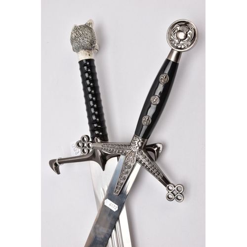 142 - TWO REPLICA COPY SWORDS a Medieval style approximately 83cm length blade, angled downward cross-guar... 