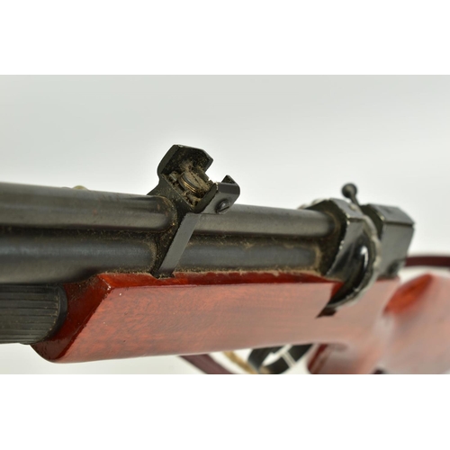 23 - AN UNDER LEVER .17'' PUMP ACTION AIR RIFLE fitted with a rotary multishot magazine which uses a bolt... 