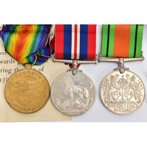 56 - A FAMILY RELATED GROUP OF MEDALS as follows, British War & Victory Medal pair named S4-217831 Pte H.... 