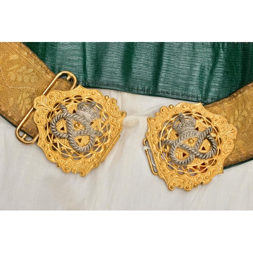 64 - A BOXED LADIES ? MILITARY STYLE STABLE BELT, with a very ornate gilded two part buckle with silver S... 