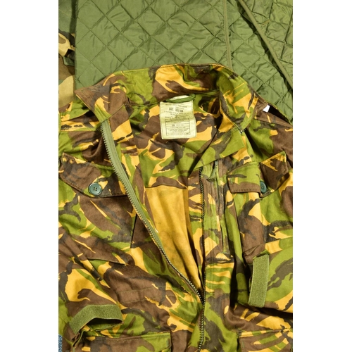 76 - A NUMBER OF CAMOFLOUGE MILITARY UNIFORM ITEMS to includ, British Combat Smock liner size 4 sleeveles... 