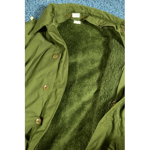 77 - A NUMBER OF MILITARY UNIFORM ITEMS to include, Post WWII 'Becker' Olive shirt, 'Wahler' 1987 dated M... 