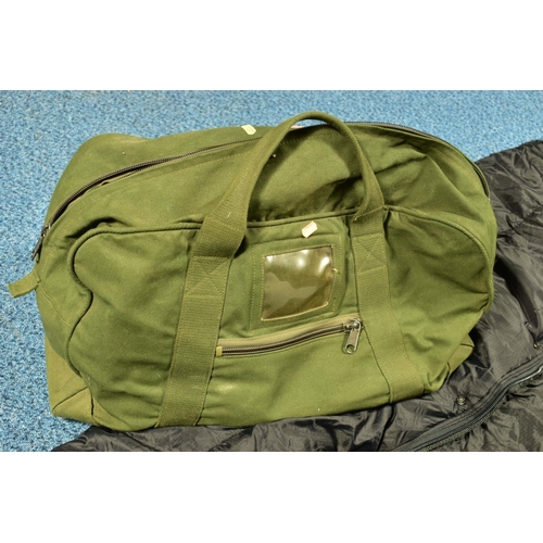 78 - A BLACK MILITARY STYLE MODULAR COLD WEATHER SLEEPING BAG contained in a drab olive Military Grip bag