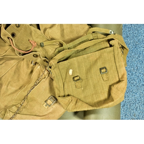 79 - A BOX CONTAINING THREE MILITARY BAGS, one being a back pack with metal frame, and a length of padded... 