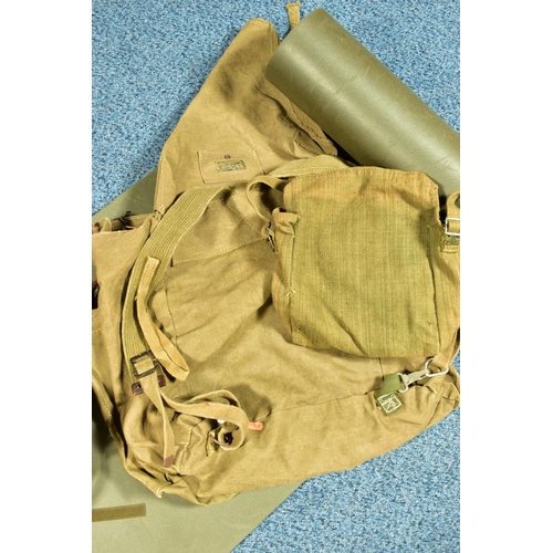 79 - A BOX CONTAINING THREE MILITARY BAGS, one being a back pack with metal frame, and a length of padded... 