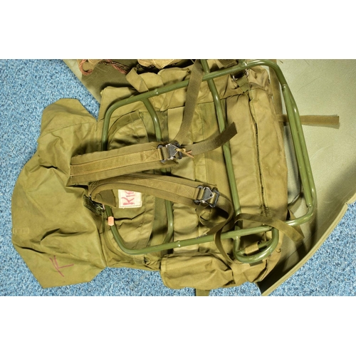 79 - A BOX CONTAINING THREE MILITARY BAGS, one being a back pack with metal frame, and a length of padded... 