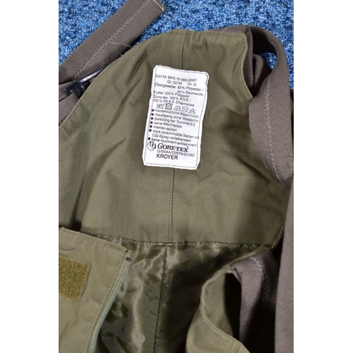 83 - A BOX CONTAINING VARIOUS MILITARY STYLE ITEM including trousers, webbing belts blue over jacket and ... 