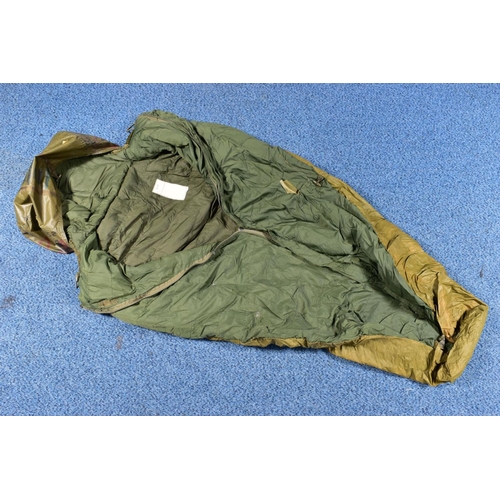 86 - A MILITARY ROLL-OUT SLEEPING BAG contained in its own cover