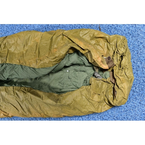 86 - A MILITARY ROLL-OUT SLEEPING BAG contained in its own cover