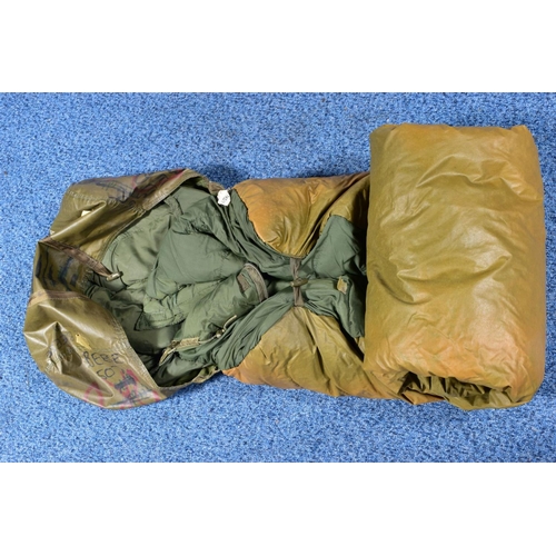 86 - A MILITARY ROLL-OUT SLEEPING BAG contained in its own cover