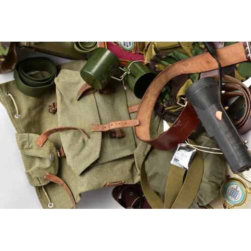 88 - A LARGE BOX CONTAIING VARIOUS MILITARY ITEMS including folding spade, medical equipment tine, hats, ... 