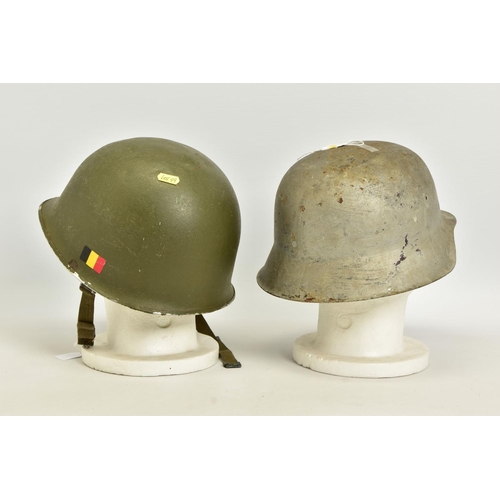 97 - TWO MILITARY HELMETS to include a USA Pattern M1 helmet in Green, strap complete but no internal lin... 