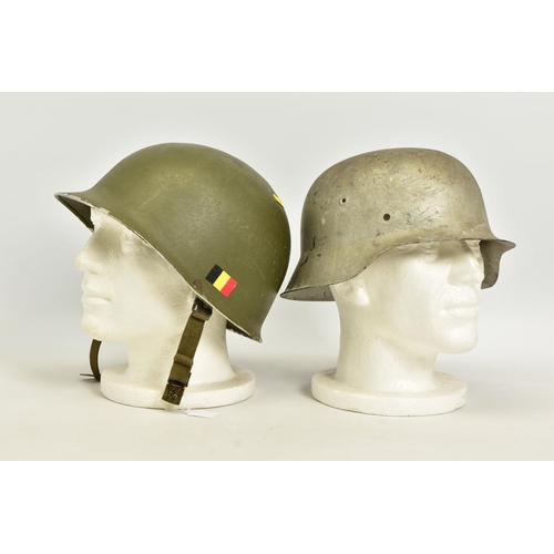 97 - TWO MILITARY HELMETS to include a USA Pattern M1 helmet in Green, strap complete but no internal lin... 