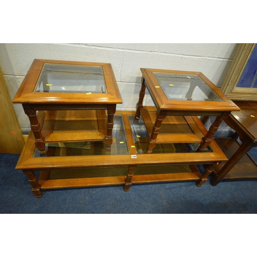 1399 - A CHERRYWOOD COFFEE TABLE with two glass inserts, and two matching occasional tables, along with an ... 