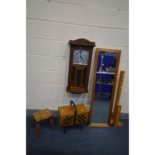 1403 - AN EARLY 20TH CENTURY OAK WALL CLOCK, along with a cantilever sewing box, a milking stool and a pine... 