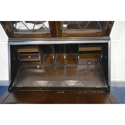 1407 - A DARK OAK BUREAU BOOKCASE, width 76cm x depth 42cm x height 182cm (keys faulty, top section locked)