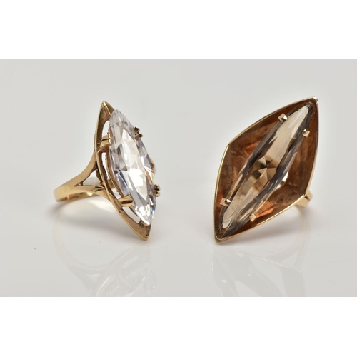 149 - TWO 9CT GOLD DRESS RINGS, the first designed with a marquise shape smokey quartz within a four claw ... 