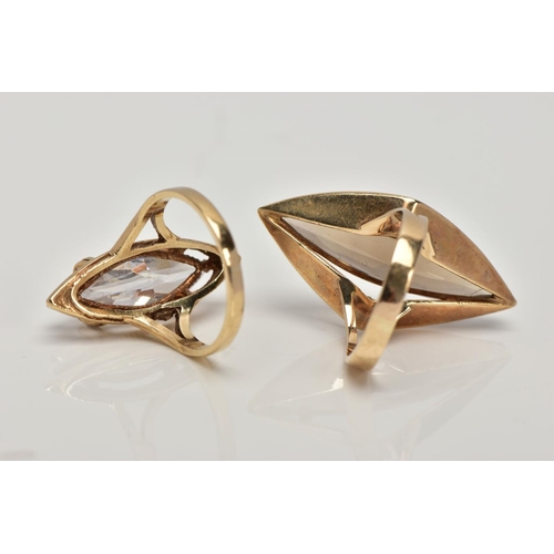 149 - TWO 9CT GOLD DRESS RINGS, the first designed with a marquise shape smokey quartz within a four claw ... 