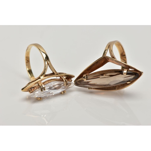 149 - TWO 9CT GOLD DRESS RINGS, the first designed with a marquise shape smokey quartz within a four claw ... 