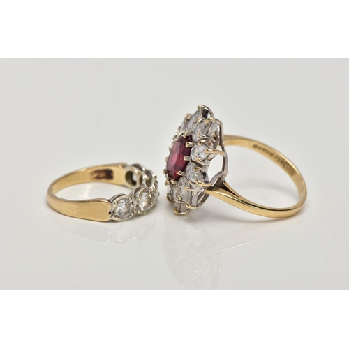 151 - TWO 9CT GOLD DRESS RINGS, the first designed with a central oval garnet within a colourless cubic zi... 