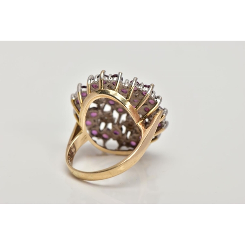 153 - A 9CT GOLD RUBY AND DIAMOND CLUSTER RING, designed as a tiered cluster of single cut diamonds and ci... 