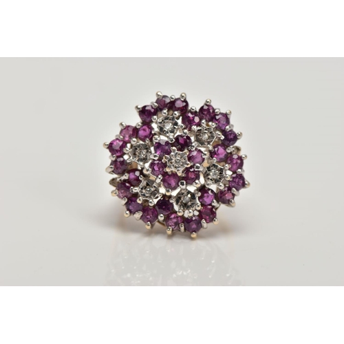 153 - A 9CT GOLD RUBY AND DIAMOND CLUSTER RING, designed as a tiered cluster of single cut diamonds and ci... 