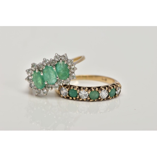 155 - TWO 9CT GOLD EMERALD AND CUBIC ZIRCONIA RINGS, the first designed as a row of three oval cut emerald... 