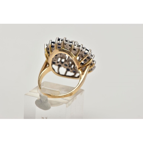 156 - A 9CT GOLD SAPPHIRE AND DIAMOND CLUSTER RING, the tiered cluster claw set with circular blue sapphir... 