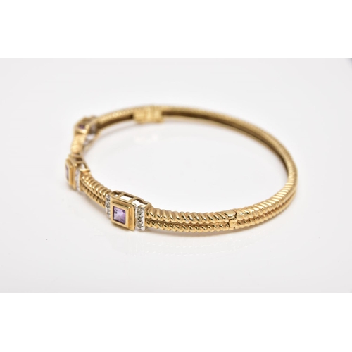 164 - A 9CT GOLD AMETHYST AND DIAMOND HINGED BANGLE, the bangle with a twist pattern, set with three squar... 