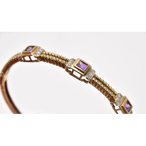 164 - A 9CT GOLD AMETHYST AND DIAMOND HINGED BANGLE, the bangle with a twist pattern, set with three squar... 