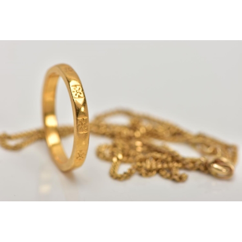 170 - A 22CT GOLD RING AND A 9CT GOLD CHAIN NECKLACE, the band ring with repeated engraved simple flower d... 