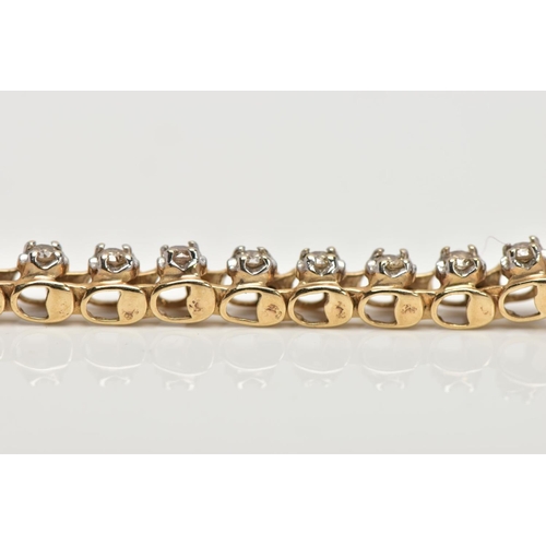 171 - A 9CT GOLD DIAMOND LINE BRACELET, each brilliant cut diamond within a four claw setting, to the push... 