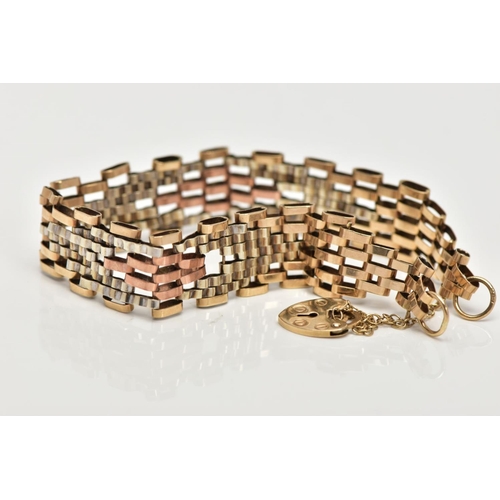 173 - A 9CT GOLD TRI-COLOUR GATE BRACELET, the gate bracelet designed with yellow, white and rose gold lin... 