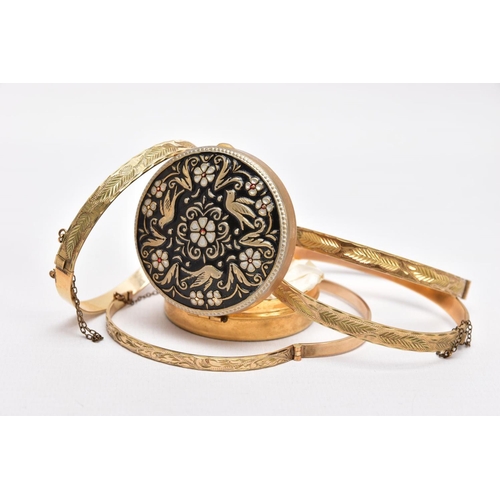 180 - FOUR ROLLED GOLD HINGED BANGLES, each with an engraved foliate or scroll design, each with slide loc... 