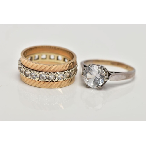 187 - TWO YELLOW METAL SPINEL SET DRESS RINGS, the first a full eternity ring, textured rim set with a row... 