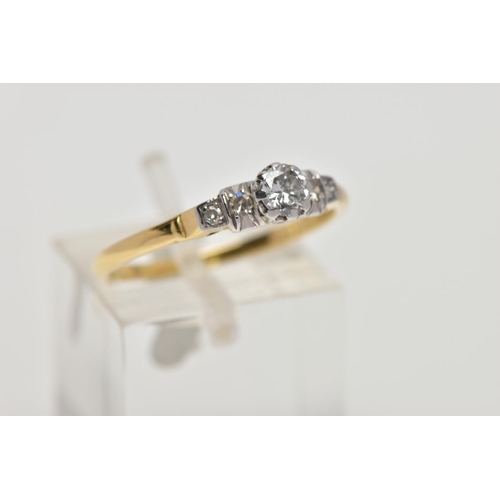 193 - A FIVE STONE DIAMOND RING, designed with a central brilliant cut diamond within an eight claw mount,... 