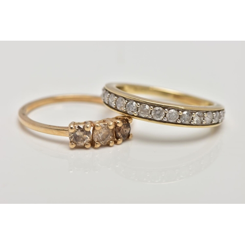 200 - TWO 9CT GOLD DIAMOND SET RINGS, the first a three stone brilliant cut diamond ring with champagne co... 