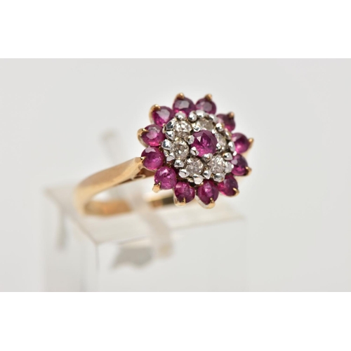 203 - A 9CT GOLD RUBY AND DIAMOND CLUSTER RING, designed as a tiered cluster of circular cut rubies and br... 