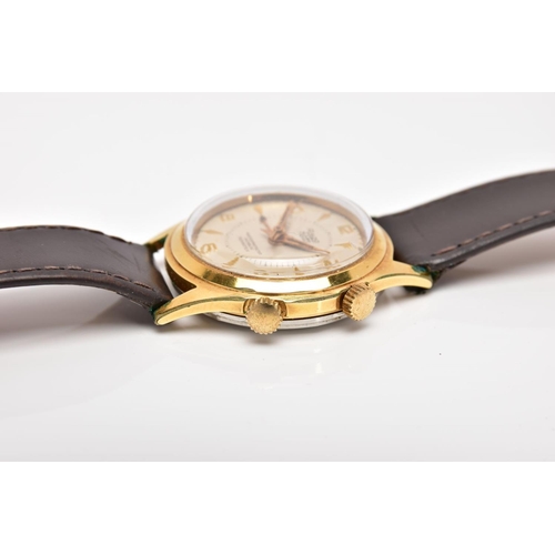 208 - A VINTAGE RADO ALARM WRISTWATCH, the circular head with cream face and gold coloured numbers, batons... 