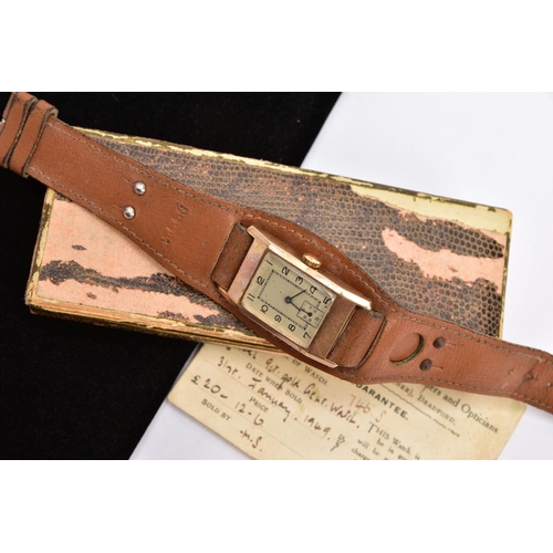 222 - A VINTAGE WRISTWATCH, the rectangular head with black Arabic numerals, a subsidiary seconds dial to ... 