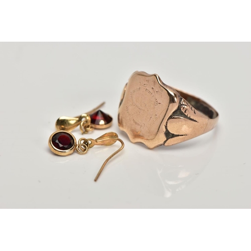 246 - A GENTS 9CT GOLD SIGNET RING AND A PAIR OF YELLOW METAL GARNET DROP EARRINGS, the ring designed with... 