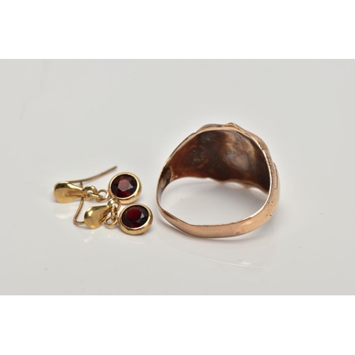 246 - A GENTS 9CT GOLD SIGNET RING AND A PAIR OF YELLOW METAL GARNET DROP EARRINGS, the ring designed with... 