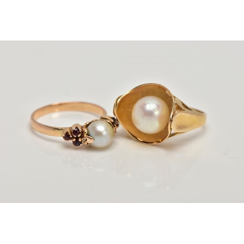 279 - TWO YELLOW METAL CULTURED PEARL RINGS, the first set with a single cultured pearl, flanked with circ... 