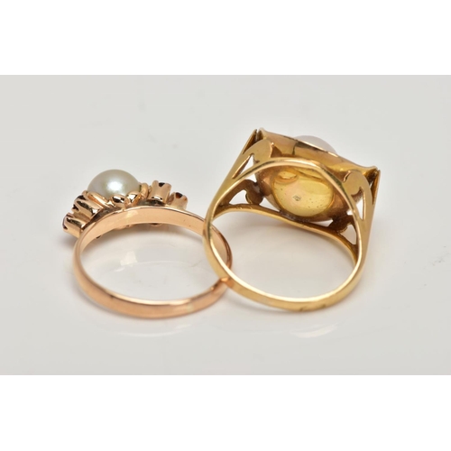 279 - TWO YELLOW METAL CULTURED PEARL RINGS, the first set with a single cultured pearl, flanked with circ... 