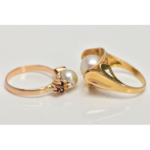 279 - TWO YELLOW METAL CULTURED PEARL RINGS, the first set with a single cultured pearl, flanked with circ... 