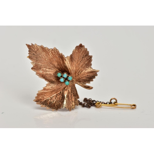 283 - A 9CT GOLD BROOCH, in the form of a textured leaf, to the centre are five small turquoise cabochons,... 